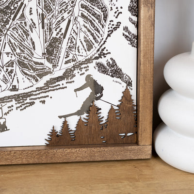 Laser-engraved Park City Mountain ski map with close-up bottom right corner, etched skier & trail details with engraved pine trees