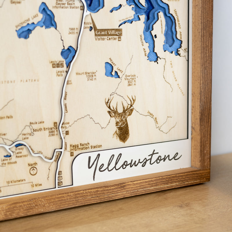 Yellowstone National Park close up of   bottom corner with title, trail names, lake layers, and wildlife details