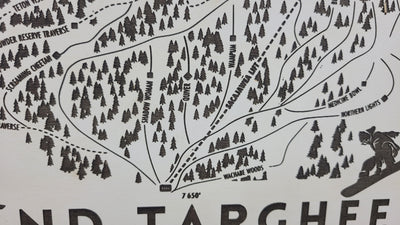 close up of Wooden ski map of Grand Targhee trails and trail names