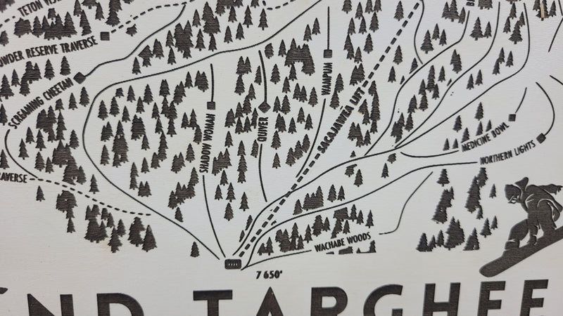 close up of Wooden ski map of Grand Targhee trails and trail names