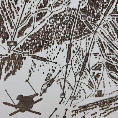 Laser-engraved Park City Mountain ski map with close-up etched skiers and trail details