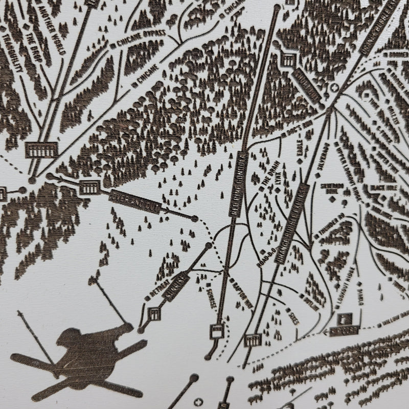 Laser-engraved Park City Mountain ski map with close-up etched skiers and trail details